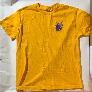 The Hundreds Vibrant Yellow Tee with Purple Adam Bomb Graphic